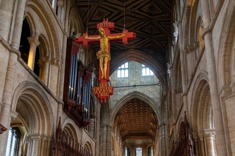 Interior of cathedral church, Peterborough, Cambridgeshire, England, UK looking up at sculpture of