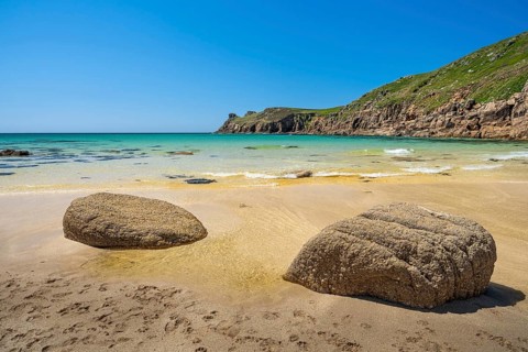Sandy beach beach and rocks in Nanjizal Bay or Nanjizal Beach. St Just, Penzance, Cornwall,