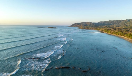 Aerial view, sandy beach and coast with waves, Playa Santa Teresa, Costa Rica, Central America