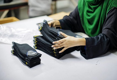 Employees of Inter Market Knit Private Limited producing socks. Lahore, 22.08.2024. Photographed on
