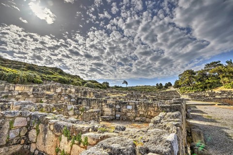 HDR, Ancient ruins with overgrown stone walls under a cloudy sky, historical site, Hellenistic