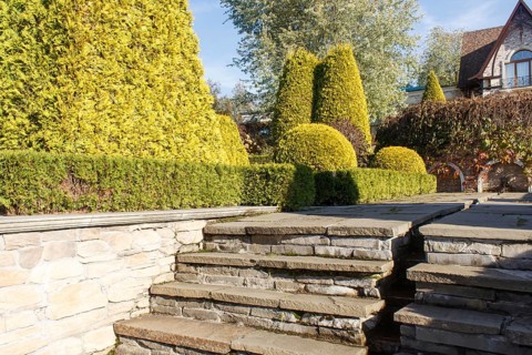 Cottage garden with stone stairs and retaining wall, Modern landscape design