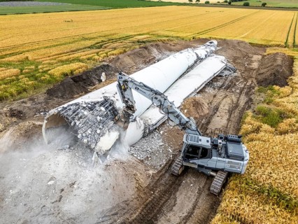 Demolished tower of a 20 year old wind turbine, in the Werl wind farm, 5 old Enercon E-66 turbines