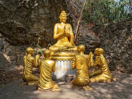 Statue of Buddha teaching disciples, Phousi or Phu Si Hill, Luang Prabang, Laos, Asia