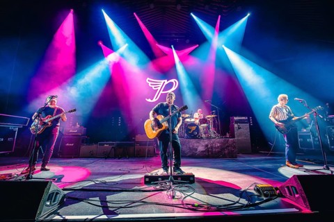 Joey Santiago (guitarist), Black Francis (singer and guitarist), David Lovering (drummer) and Emma
