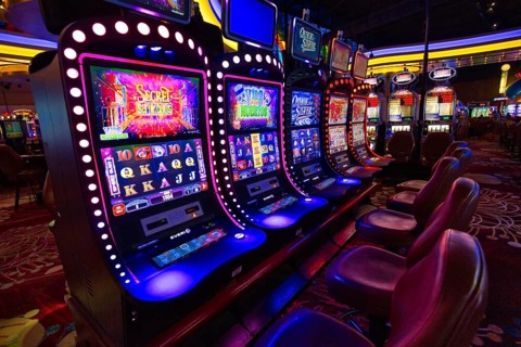 Buffalo, USA-20 July, 2018: Modern casino hall with slot machines, roulette and blackjack tables