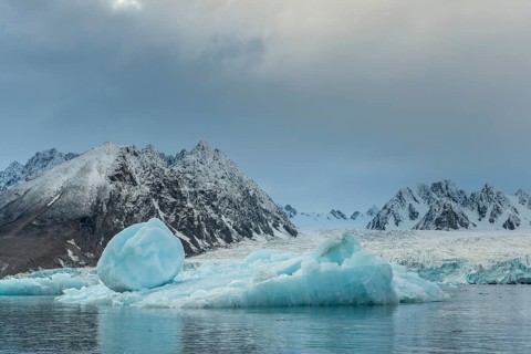 Iceberg in front of the glacier edge of Monacobreen, Liefdefjord, Woodfjord area, Spitsbergen