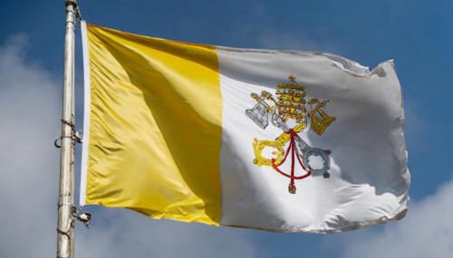 Flags, the national flag of the Vatican, Vatican State fluttering in the wind