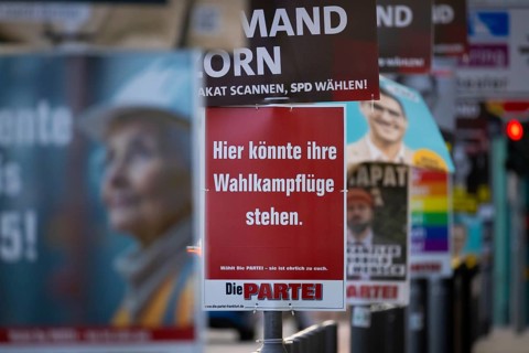 A poster with the inscription Here could be your election campaign wings. hangs between numerous