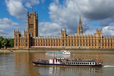Excursion boats on the Thames at the Houses of Parliament, London, England, Great Britain