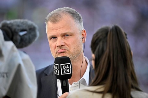 Chief Sports Officer Fabian Wohlgemuth VfB Stuttgart in front of TV camera in interview Microphone