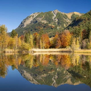 Rubihorn, 1957m, Gaisalphorn, 1953m, and Schattenberg, 1845m, water reflection in the moor pond,