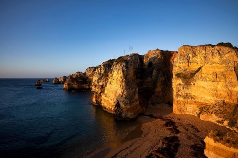 Colourful cliffs and rocks at sunrise on the beach, Praia da Dona Ana, Lagos, cliffs, Atlantic