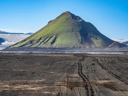 Mælifell mountain covered with moss, Maelifell, black sand desert Mælifellssandur, glacial streams,