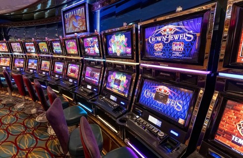 Seattle, USA, 18 September 2022: Casino gambling blackjack and slot machines waiting for gamblers