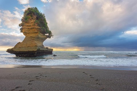 Rock formation shaped like a boot, Punakaiki, Paparoa National Park, South Island, New Zealand,