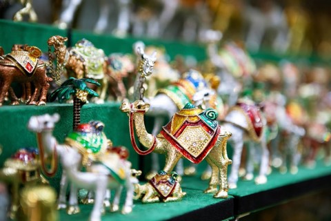 Souvenir camels in the souk or soug or market in the old town of Nizwa, ad-Dachiliyya region, Oman,