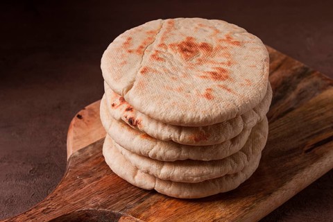 Pita bread, stack, on the table, no people