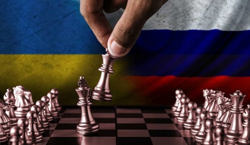 Russia vs Ukraine flag concept on chessboard. Political tension between Russia and Ukraine.