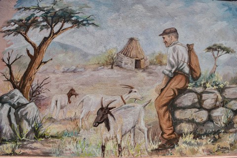 Mural of Sardinian shepherd, artist Pasqualino Baingiu, Orgosolo, Province of Nuoro, Sardinia,