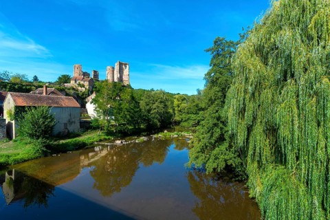 Herisson labeled Small City of Character. View on the castel of Ducs de Bourbon and river Aumance.