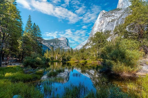 Reflections in the water of the Yosemite Mountains in Mirror lake, Yosemite. California, United
