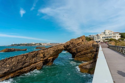 Wooden bridge together to Plage du Port Vieux in Biarritz, holiday in south-eastern France.