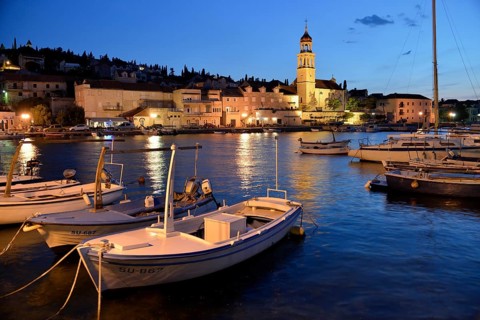 Fishing boats in the harbour of Sutivan front of the Sveti Ivan Church, Sutivan, Island Brac,