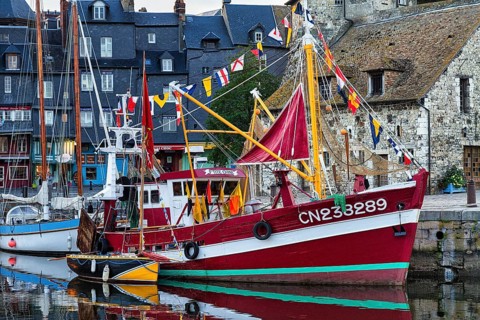 Decorated fishing boat Little China, harbour basin in the old town, Honfleur in the evening,