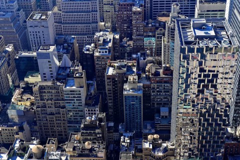 Viewing terrace of Rockefeller Center, overview of a dense collection of buildings and urban