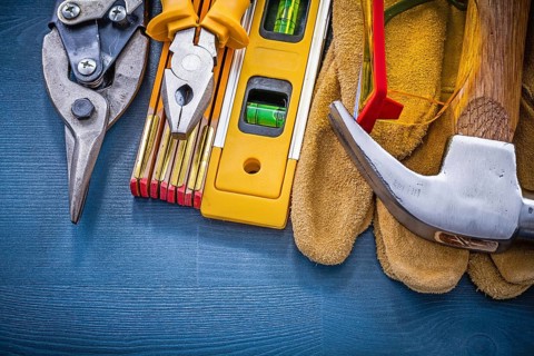 Top view of construction equipment on wood board