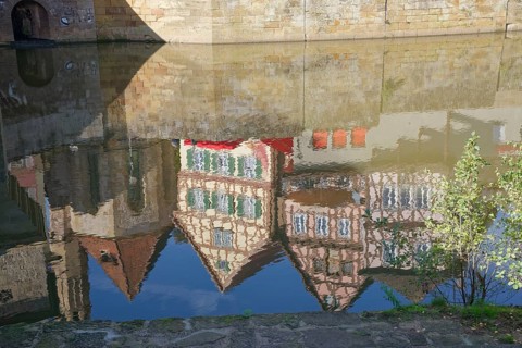 Reflection of half-timbered houses and St John's Church, Kocher Valley, Kocher, Schwäbisch Hall,