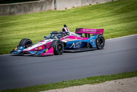HELIO CASTRONEVES (66) of Sao Paulo, Brazil practices for the XPEL Grand Prix at Road America in