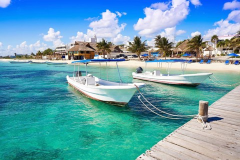 Puerto Morelos beach boats in Mayan Riviera Maya of Mexico