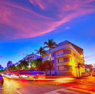 Miami Beach South Beach sunset in Ocean Drive Florida Art Deco and car lights