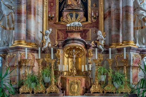 Main altar with candles and tabernacle, St George and Florian is a listed Catholic parish church in