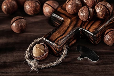 Small Vinatge Chopping Board And Macadamia Nuts