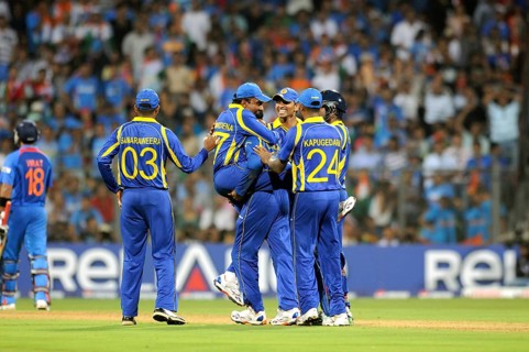 Sri Lankan player 2L Mahela Jaywerdena leaps wicket batsman Virat Kohli L ICC Cricket World Cup