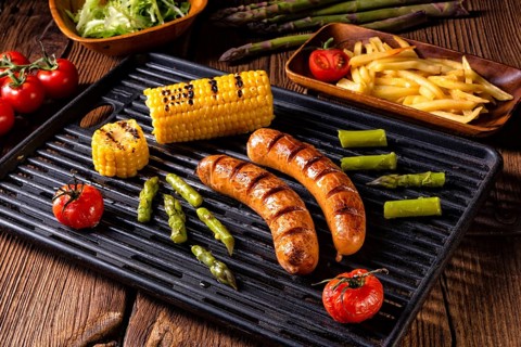 Grilled krakauer with french fries and green salad