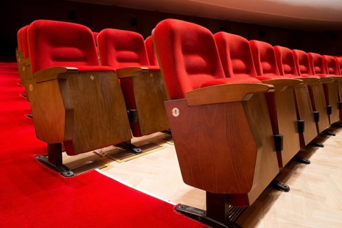 Red seats in a theater and opera