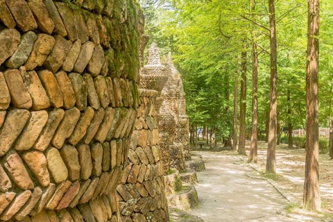 Daejeon, South Korea, August 16, 2020: Large intricately designed brick structures beside hiking