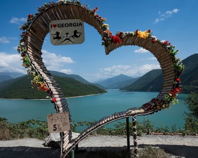 ZHINVALI, GEORGIA - AUGUST 18, 2023: Big heart next to water reservoir artificial lake Zhinvali in
