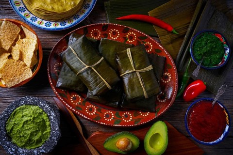 Tamale Mexican food recipe with banana leaves steamed