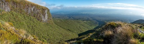 Hiking the Mount Taranaki on a sunny summer day, New Zealand, Oceania