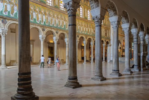 Tourists visit in the Basilica of Sant Apollinare Nuovo, Ravenna, Italy, Europe