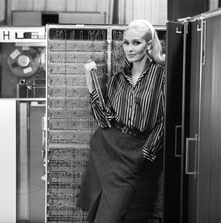 In the 1960s. Fashion model wearing the typical clothes of 1965. The photograph is taken in a 1960s