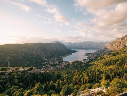 View of the valley of the Bay of Kotor surrounded by a high mountain range. Montenegro. Drone.
