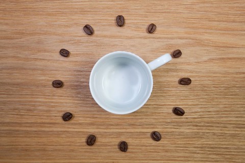 Coffee Time - Empty coffee cup and clock of coffee beans