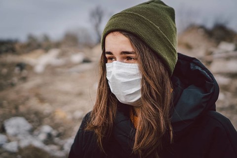 Portrait of young woman wearing medical mask, health protection from influenza virus, epidemic and