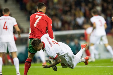 Football match, captain Cristiano RONALDO CR7 Portugal left looking from behind in a duel with